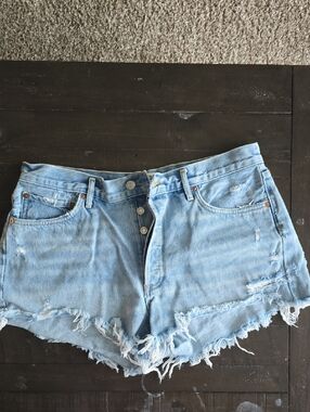 Agolde High-Rise Light Blue Distressed Denim Shorts